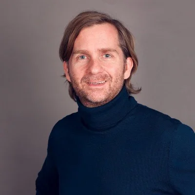 Portraitfoto von Christopher Mangels, Solution Architecture & IT-Transformation